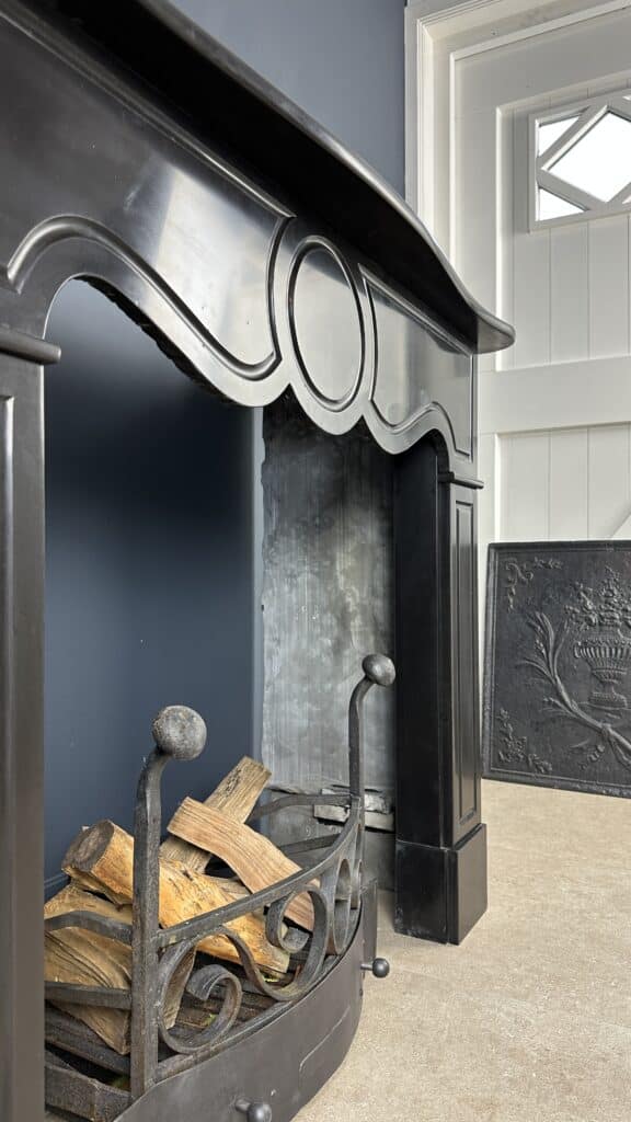 Black Antique Circular Fireplace with Round Detail