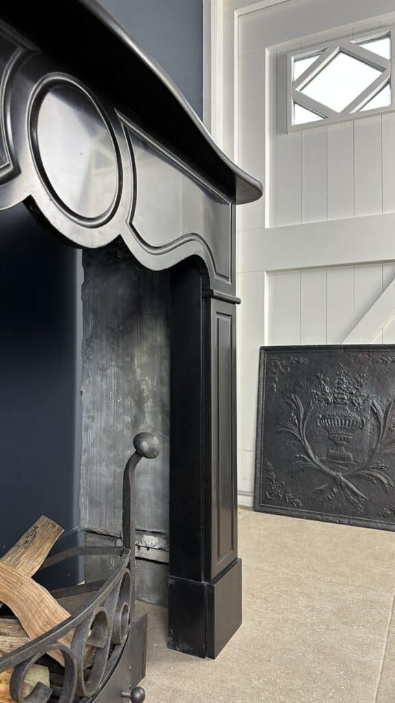 Black Antique Circular Fireplace with Round Detail