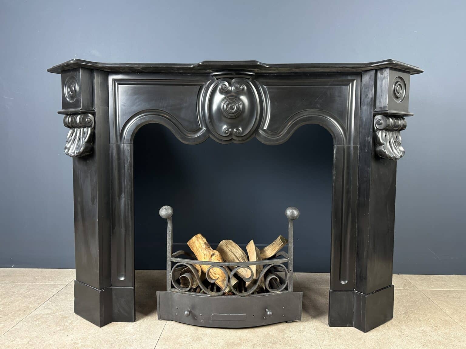 Distinctive Antique Black Circular Fireplace with Unique Front