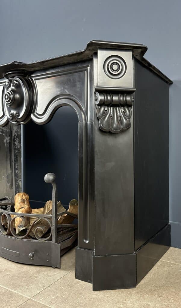 Distinctive Antique Black Circular Fireplace with Unique Front