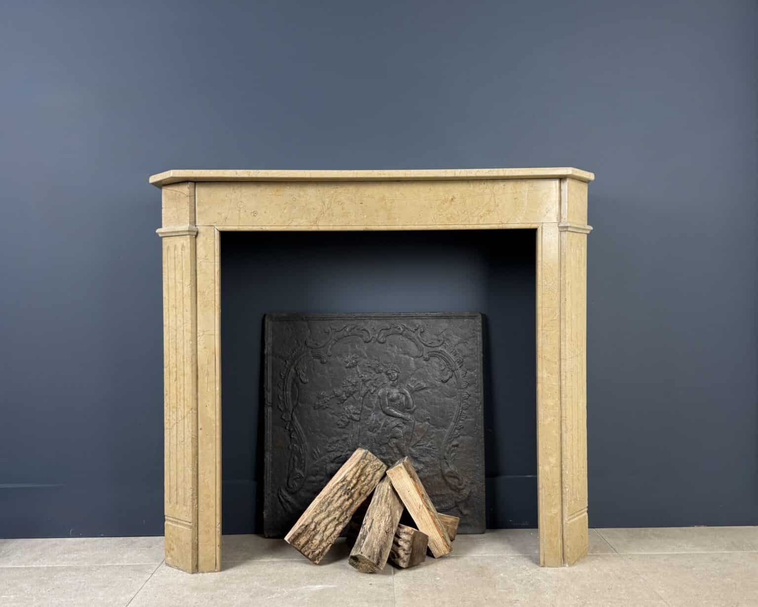Sleek Art Deco Front Fireplace in Marble
