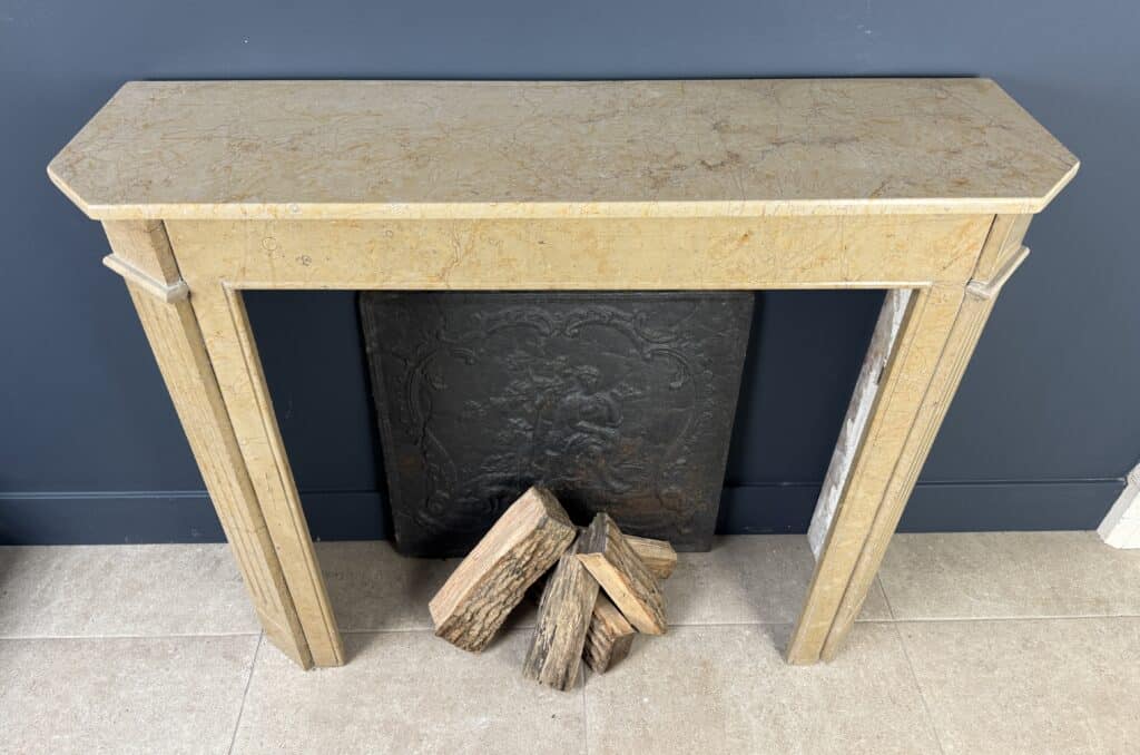 Sleek Art Deco Front Fireplace in Marble