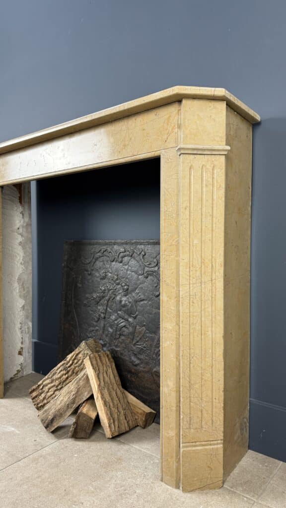 Sleek Art Deco Front Fireplace in Marble