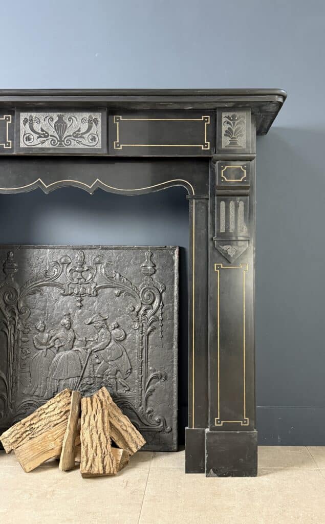 Richly Worked Black Marble Etched Front Fireplace