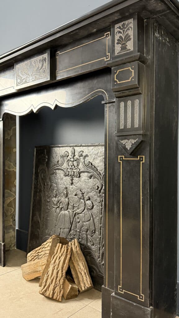 Richly Worked Black Marble Etched Front Fireplace