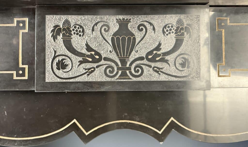Richly Worked Black Marble Etched Front Fireplace