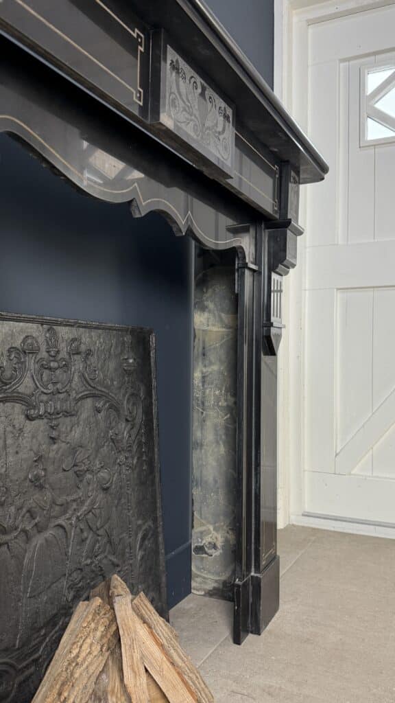 Richly Worked Black Marble Etched Front Fireplace