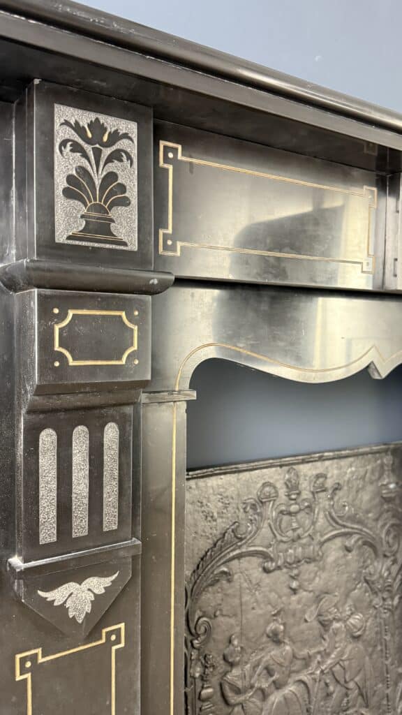 Richly Worked Black Marble Etched Front Fireplace