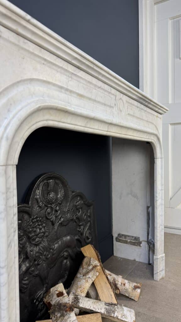 Antique White Front Fireplace with Round Frame