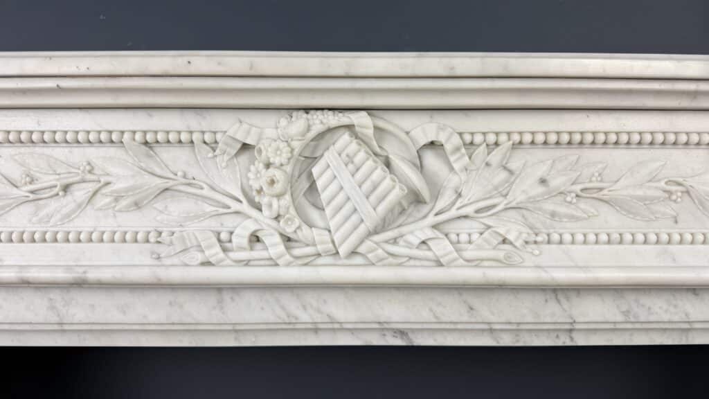 Luxurious French Louis XVI Front Fireplace in Carrara Marble with Rich Ornament