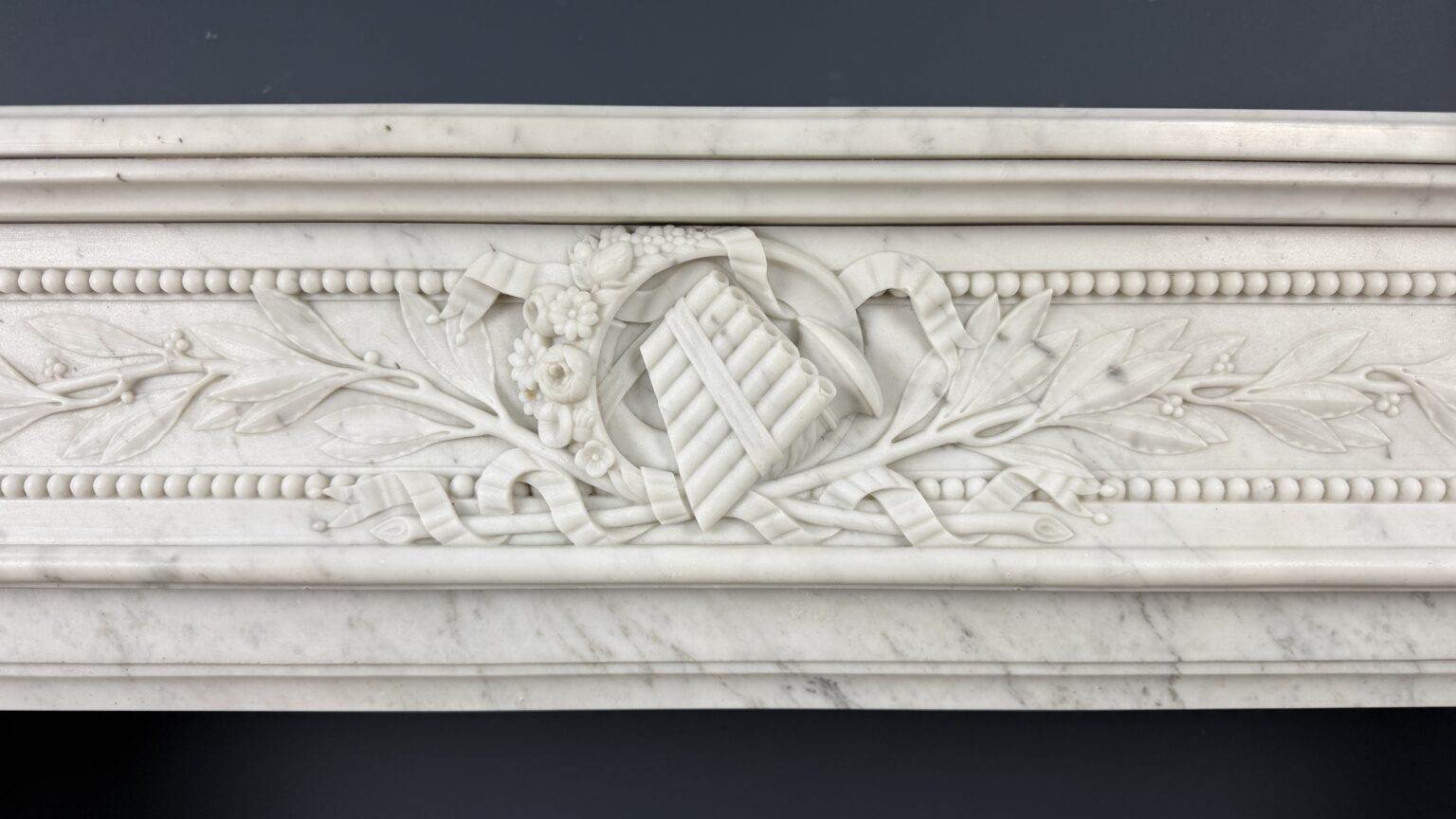 Luxurious French Louis XVI Front Fireplace in Carrara Marble with Rich Ornament — detail 2