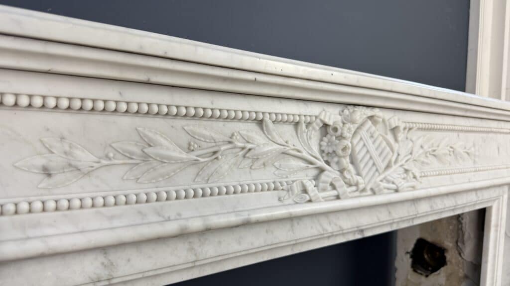 Luxurious French Louis XVI Front Fireplace in Carrara Marble with Rich Ornament