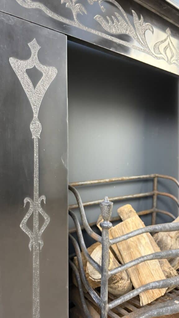 Etched Front Fireplace in Noir de Mazy Marble