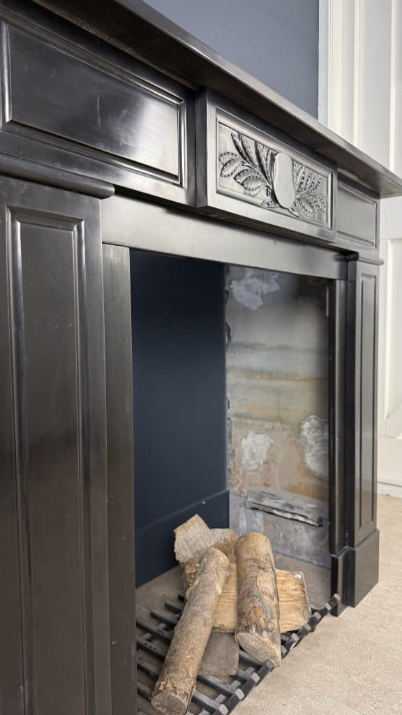 Antique Circular Fireplace in Black Marble with Leaf Ornament