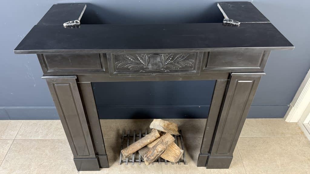Antique Circular Fireplace in Black Marble with Leaf Ornament