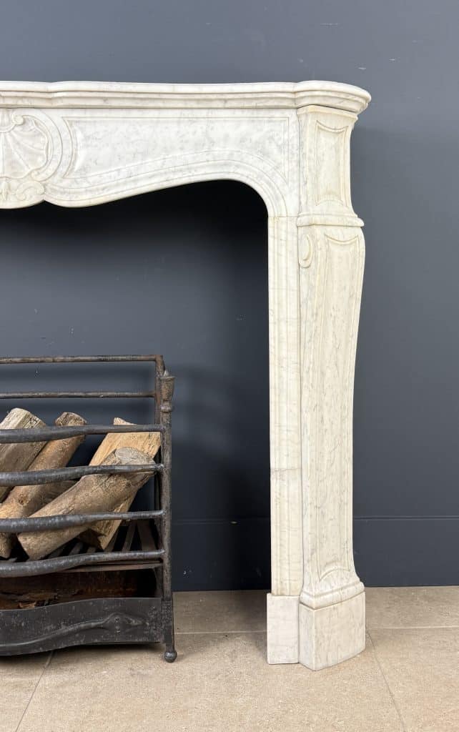 French Marble Fireplace with 45° Consoles and Shell Ornament