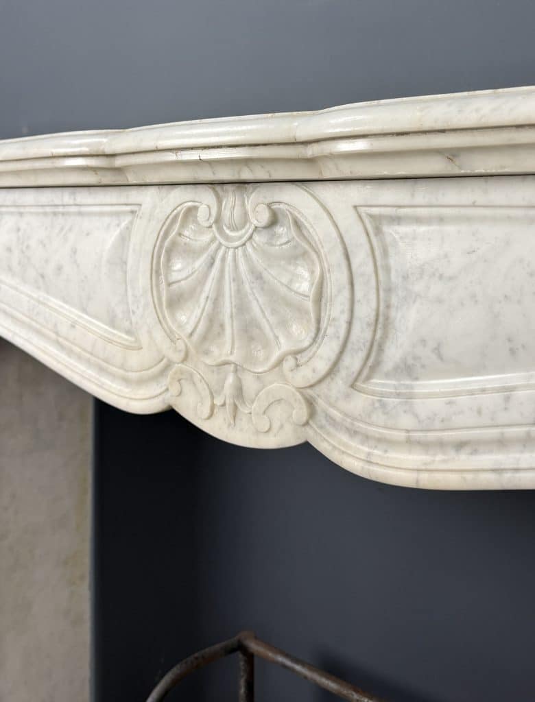 French Marble Fireplace with 45° Consoles and Shell Ornament