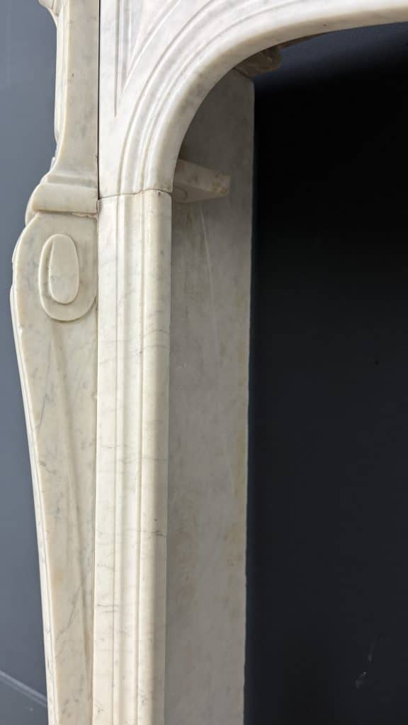 French Marble Fireplace with 45° Consoles and Shell Ornament