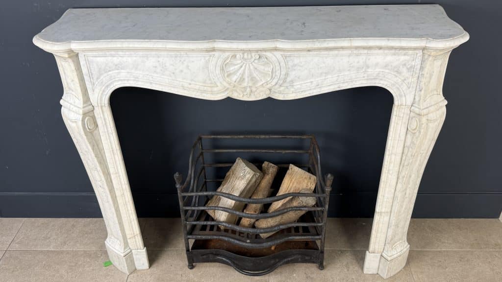 French Marble Fireplace with 45° Consoles and Shell Ornament