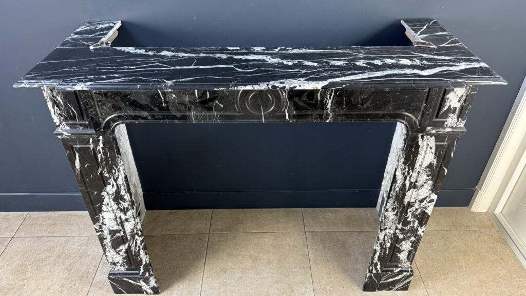 Sleek Antique Circular Fireplace in Nero Marquina Marble
