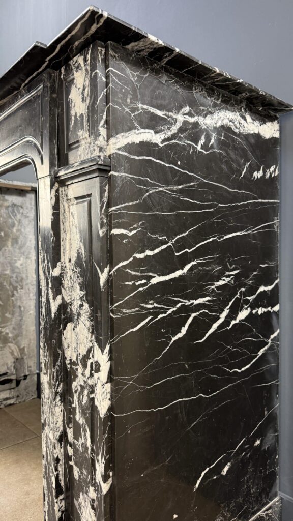 Sleek Antique Circular Fireplace in Nero Marquina Marble