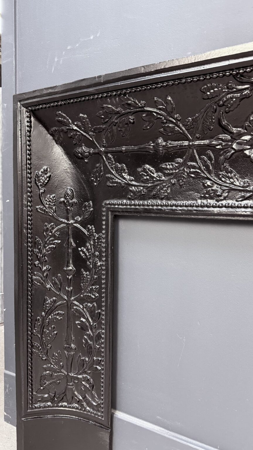 Antique Cast-Iron Insert with Fine Floral Work — detail 1